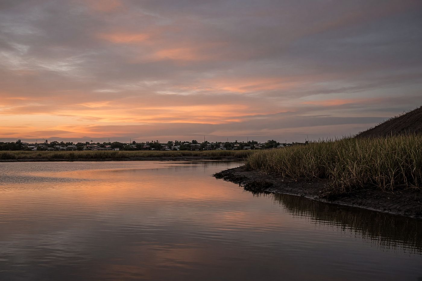 The southern shore of Lake Okeechobee at South Bay, dusk over the water